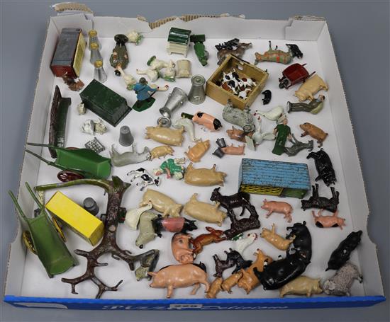 A collection of Britains farmyard animals and carts, etc.